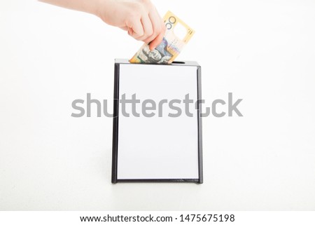 Similar – Image, Stock Photo charity fundraising donations fifty hryvnia in an acrylic box