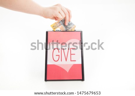 Similar – Image, Stock Photo charity fundraising donations fifty hryvnia in an acrylic box