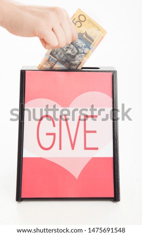 Similar – Image, Stock Photo charity fundraising donations fifty hryvnia in an acrylic box