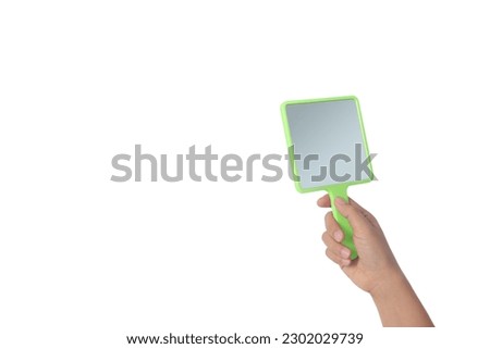 Similar – Image, Stock Photo Hand holding a mirror with daisies in reflection