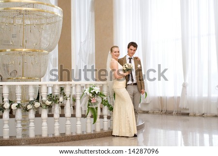 Wedding portrait of a newly-married couple. Wedding palace