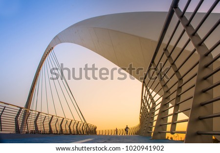 Similar – Foto Bild Stahlbruecke mit Spiegelung ueber Fluss