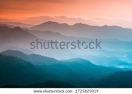Mountains under mist in the morning Amazing nature scenery  form Kerala God's own Country Tourism and travel concept image, Fresh and relax type nature image Imagine de stoc © 