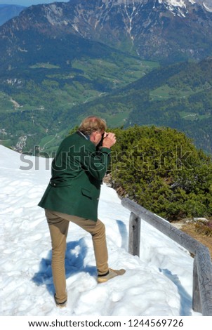 Image, Stock Photo Man in green Janker looks silly from behind his glasses