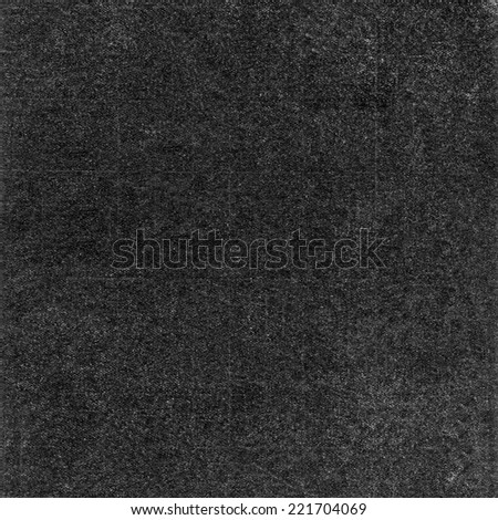 Texture of black ink on the white paper. Abstract noise texture. Gray scratched background