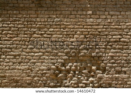 background or pattern of a broken brick stone wall, historic european church