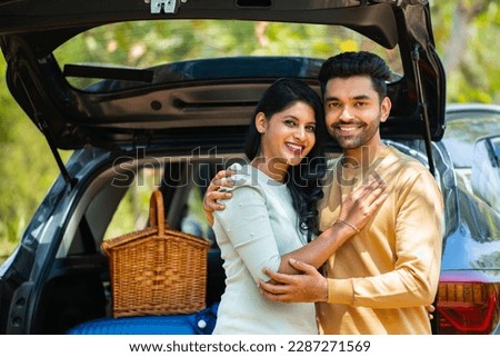 Similar – Image, Stock Photo Happy couple embracing on window sill at home