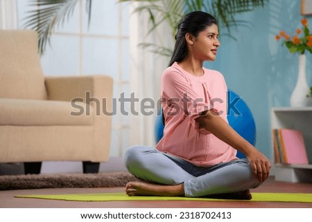 Similar – Image, Stock Photo Pregnant woman on yoga ball working out with elastic band