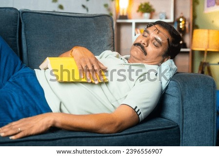 Similar – Image, Stock Photo Man with glasses sleeps and rests