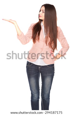 Young office lady in jeans and blazer, isolated on white