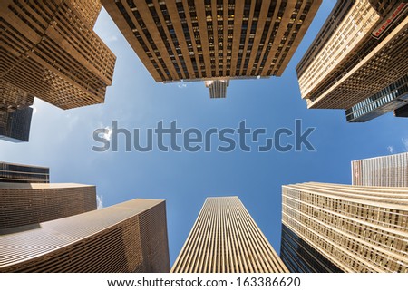 Looking up to the skyscrapers of a big city.