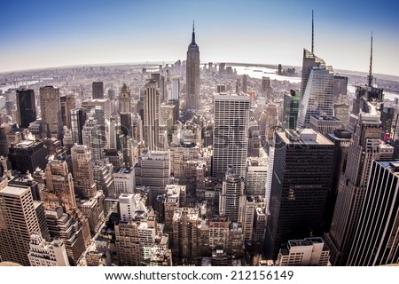 Aerial view of New York city in the USA in the afternoon showcasing its mix of historic and modern buildings.