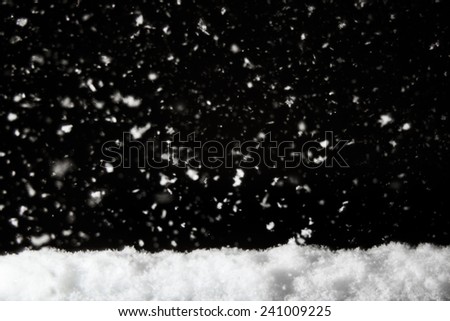 pile of snow with snowing background ,minimalistic