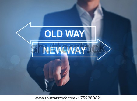 Businessman pointing Old Way vs New Way arrow.
 Improvement and change management. Business concept. 商業照片 © 
