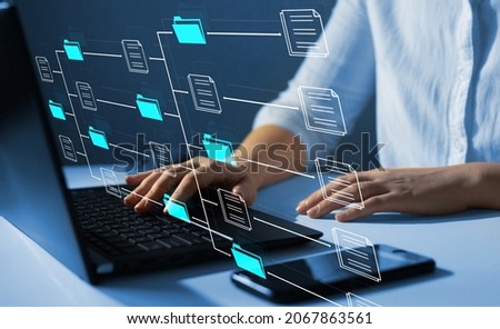 Document Management System or DMS.Consultant information technology (IT) working on laptop.Automation software to archiving and efficiently manage  and information files.Internet Technology Concept.