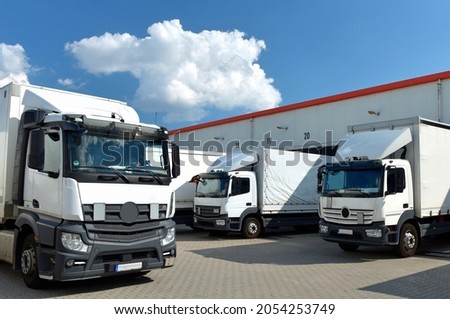 Trucks loading at a depot of a forwarding agency - Transport and logistics in goods trade ストックフォト © 