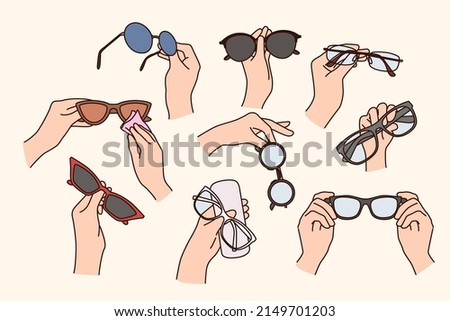 Collection of people holding various glasses for eyesight correction. Set of person hands with spectacles. Eyewear and opticians advertising. Flat vector illustration. 