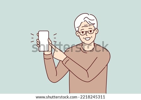 Smiling elderly man in glasses point at mockup cellphone screen. Happy mature grandfather show with finger on smartphone display. Vector illustration. 