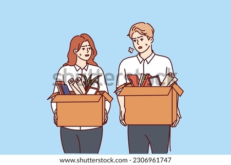 Dismissed man and woman with cardboard boxes leave workplaces after reduction of company staff due to crisis. Dismissed office workers were fired after violating corporate discipline or rules