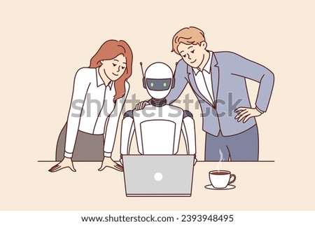 Robot employee of company and two human colleagues work together to complete tasks using laptop with innovative software. Robot with artificial intelligence sits at desk helping office clerks.