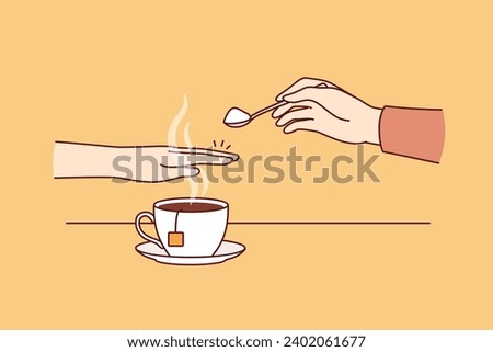 Hand of person with diabetes and refusing sugar, covering cup of tea with palm to avoid increase in insulin. Avoiding sugar due to impact on diabetes and appearance of excess weight or skin problems