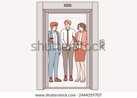 Business people ride in elevator together, going up to another department of corporation or making partner visit. Men and women working as clerks meet in elevator, showing joy at sight of colleagues