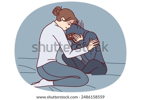 Mother consoles crying daughter who is depressed due to peer problems or poor school performance. Caring woman hugging and consoles crying girl after argument or house arrest related to bad behavior