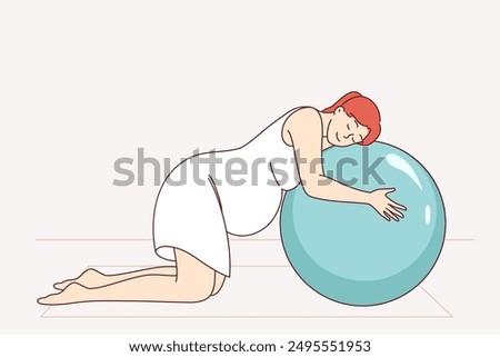 Pregnant woman doing pilates on fitness mats and leaning on inflatable ball. Preparing for childbirth for pregnant girl who cares about health and takes preventive measures to combat difficulties