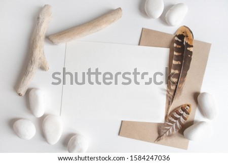 Similar – Image, Stock Photo Pebbles and feathers on table