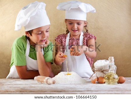Similar – Image, Stock Photo Siblings kneading dough in kitchen