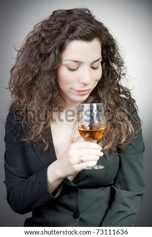 Young attractive happy smiling woman with wine