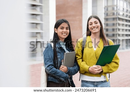 Similar – Foto Bild Zwei College-Mädchen studieren gemeinsam zu Hause mit Laptops beim Kaffeetrinken