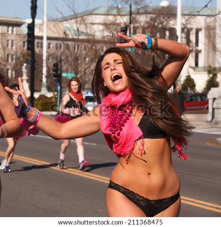 WASHINGTON, DC - FEBRUARY 9, 2013:  Woman participant in Cupid\'s Undie Run, where joggers parade through the streets of Washington, DC in their valentine day underwear for a charitable cause.
