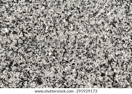 Closeup of gray granite stone plate for texture background.