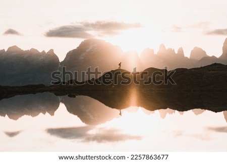 Similar – Image, Stock Photo Man walking on mountain road on Tenerife Island