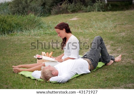 cute young couple on romantic picnic