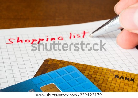 What to buy, list of purchases and credit cards on the table