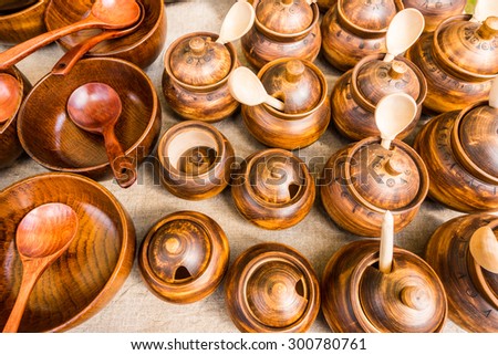 Different wooden utensils on the storefront window
