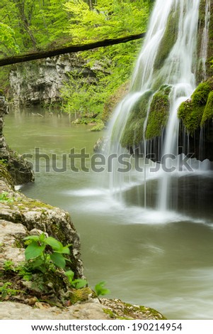 Waterfall landscape in Romania with beautiful green and waterfall named Bigar