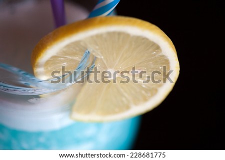 Cup of lemonade with bar interior background