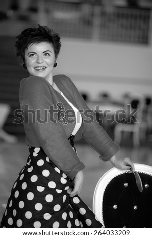 Photo session of an expressive,short haired, brunette woman. Black and white photography