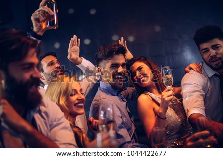 Similar – Image, Stock Photo Crop person having champagne poured into glass near pool