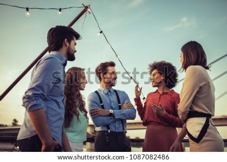 Cropped shot of a group of friends having a conversation on a boat Stock foto © 