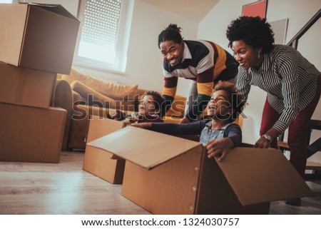 Similar – Image, Stock Photo Children playing with their toys on a wooden floor