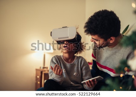 Similar – Image, Stock Photo New reality, xmas tree decorated with face masks