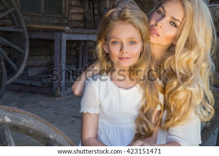 Similar – Image, Stock Photo little blonde haired girl wearing sweater
