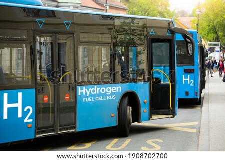 A hydrogen fuel cell buses stands at the bus station