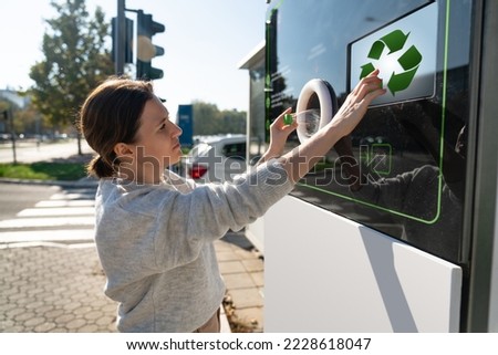 Similar – Foto Bild Frau sammelt gebrauchte Plastikflaschen im Mülleimer