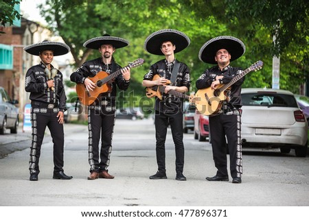 Similar – Image, Stock Photo Man playing a spanish guitar and recording with a microphone