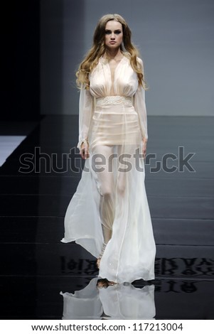 MOSCOW - OCTOBER 26: Model on podium during show of Olesya Malinskaya. Collection as part of  Volvo Fashion Week, on October 26, 2012, Moscow, Russia